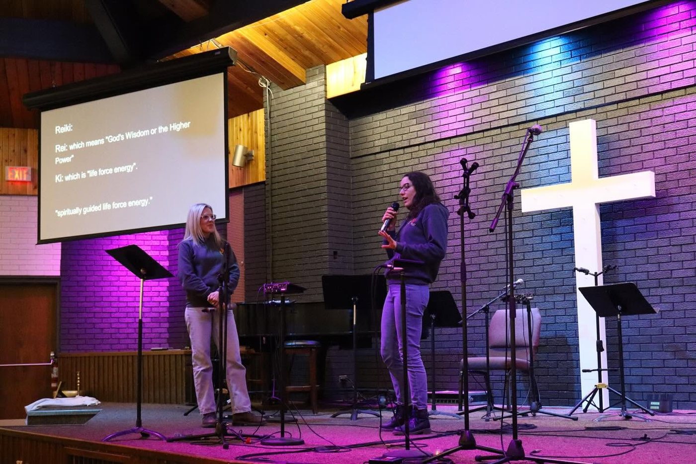 Valerie on stage at a church teaching session